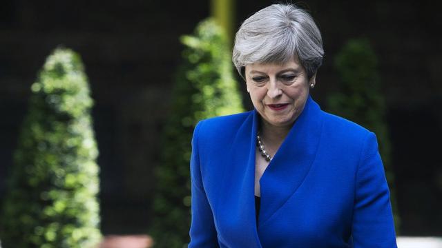 Theresa May vendredi à Downing Street. [EPA/Keystone - Will Oliver]