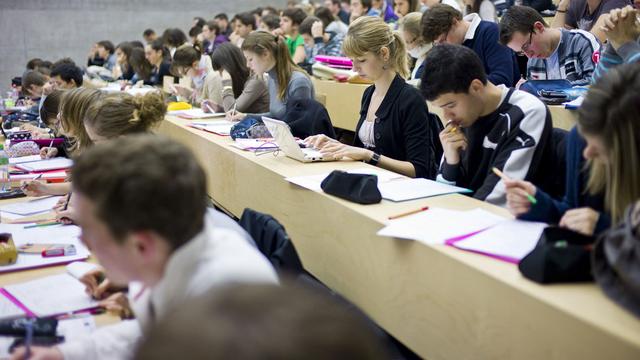 L'Union des étudiants de Suisse demande un meilleur accès des réfugiés aux études. [Keystone - Martin Rütschi]