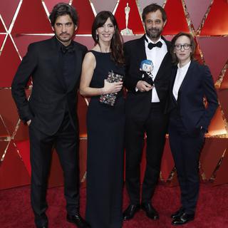 L'équipe du film "Ma vie de Courgette" à son arrivée à la cérémonie des Oscars. [keystone - EPA/Paul Buck]