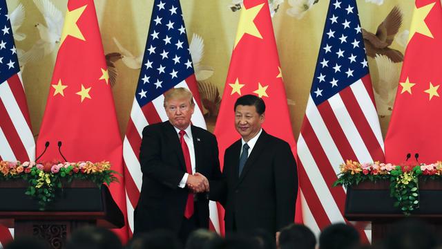 Le président américain Donald Trump avec son homologue chinois Xi Jinping, le 9 novembre à Pékin. [keystone - Andy Wong]
