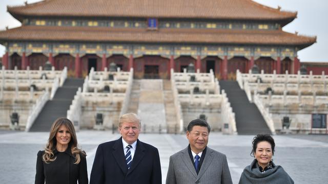 Donald Trump et Xi Jinping posent durant la visite du président américain à Pékin. [AFP - Jim WATSON]