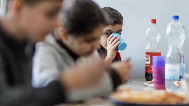 Les enfants réfugiés sont insuffisamment informés de leurs droits, dénonce Caritas. (image d'illustration). [Keystone - Gaetan Bally]