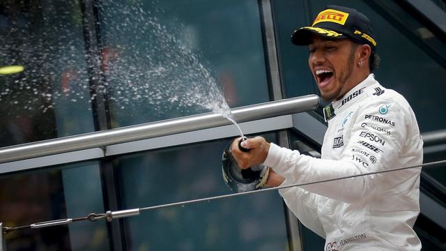 Lewis Hamilton a décroché son premier succès de la saison à Shanghaï. [Keystone - Diego Azubel]