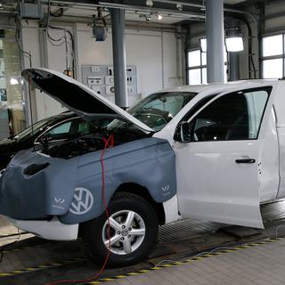 Les patrons de l'industrie automobile allemande et le Gouvernement se penchent sur le sort des voitures diesel. [Reuters - Fabrizio Bensch]