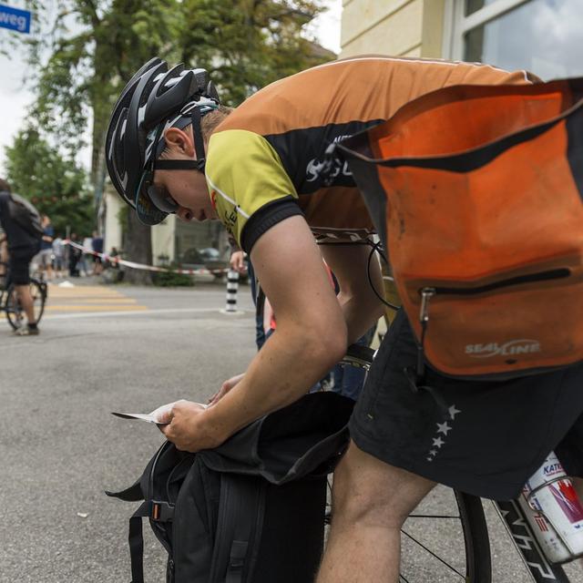 Les coursiers à vélo. [Keystone - Alessandro della Valle]