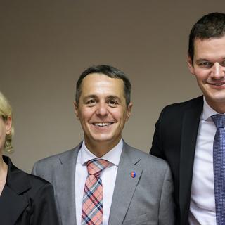 Les trois candidats PLR à la succession de Didier Burkhalter. [Keystone - Jean-Christophe Bott]