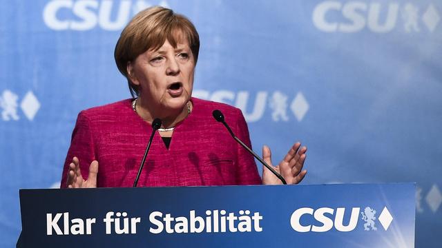 Angela Merkel lors de son dernier meeting de campagne à Munich. [EPA/Keystone - Christian Bruna]