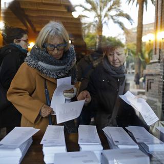 Bureau de vote à Barcelone, jeudi 21.12.2017. [AP/Keystone - Santi Palacios]