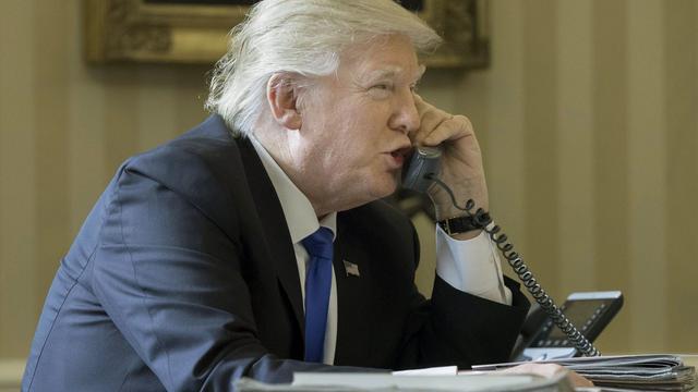 Donald Trump avait téléphoné à Angela Merkel le 28 janvier. [EPA/Keystone - Michael Reynolds]