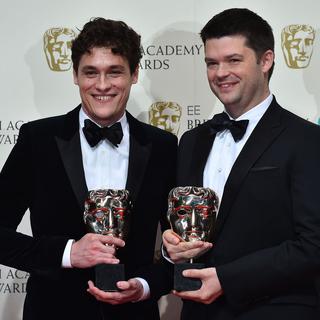 Les réalisateurs Phil Lord et Christopher Miller, ici le 8 février 2015 à Londres. [AFP - Ben Stansall]