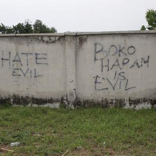 Des inscriptions sur des murs à Borno, au Nigeria, dénonçant l'organisation islamiste Boko Haram. [Reuters - Afolabi Sotunde]