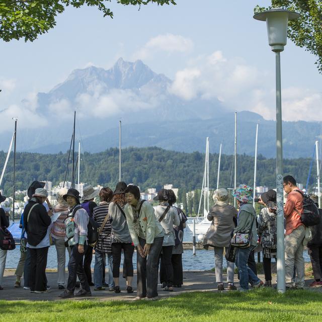 Les touristes asiatiques devraient revenir cet été. [keystone - Sigi Tischler]