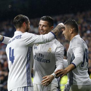 Les joueurs du Real Madrid Cristiano Ronaldo, Sergio Ramos et Casemiro. [Keystone]