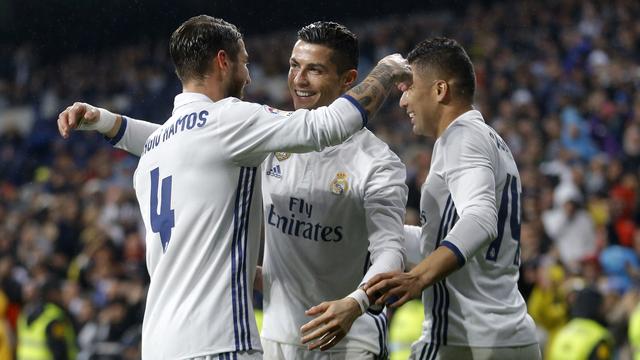 Les joueurs du Real Madrid Cristiano Ronaldo, Sergio Ramos et Casemiro. [Keystone]