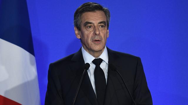 François Fillon lors de son intervention devant les médias lundi à Paris, pour faire la lumière sur les soupçons d'emplois fictifs dont aurait bénéficié sa famille. [AFP - Martin Bureau]