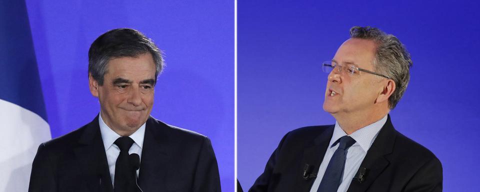 Le candidat malheureux à la présidentielle française François Fillon et le ministre Richard Ferrand. [EPA/Keystone - Etienne Laurent/Charles Platiau]