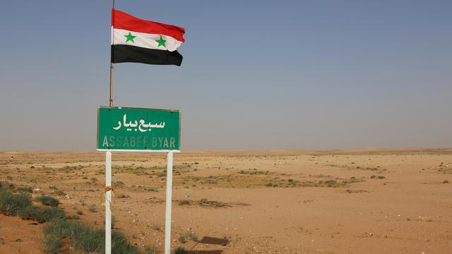 Un drapeau syrien flotte sur une route du désert de Saba'Biyar, près de la frontière avec l'Iraq.
STRINGER
AFP [AFP - STRINGER]