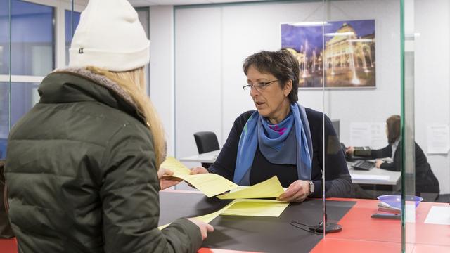 Une caisse de chômage du canton de Berne. [keystone - Peter Klaunzer]