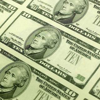 Le fléchissement du dollar est une bonne nouvelle pour le président américain. [Reuters - Win McNamee]