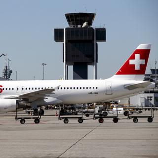 Un avion de Swiss à l'aéroport de Genève. [Keystone - Salvatore Di Nolfi]