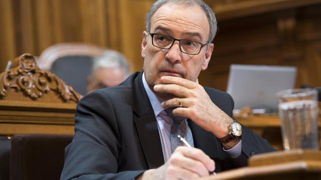 Le conseiller fédéral Guy Parmelin s'est retrouvé au milieu d'un véritable tir croisé lors de la session du Conseil fédéral. [Anthony Anex]