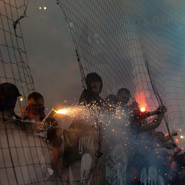 Des hooligans lors d'un match du championnat russe de football.
Alexander Vilf/Sputnik
AFP [AFP - Alexander Vilf/Sputnik]