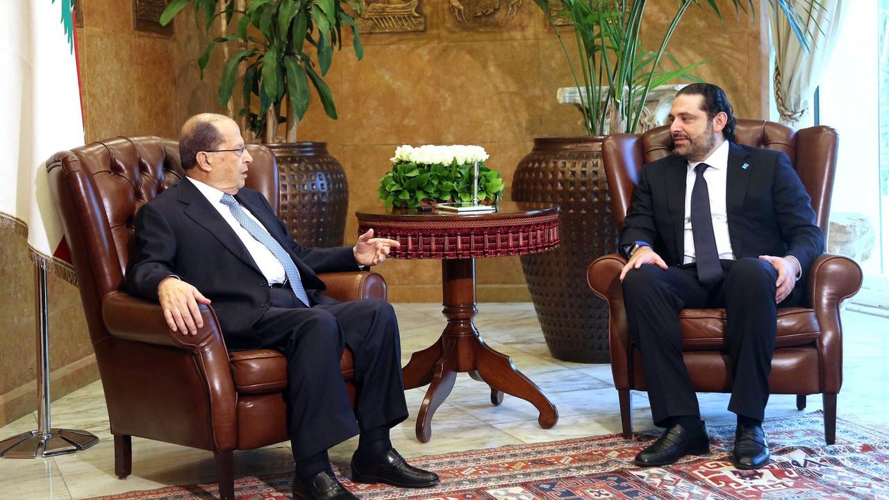Saad Hariri, à droite sur la photo, s'entretient avec le président libanais Michel Aoun, à Beyrouth en 2016. [EPA/Keystone - Wael Hamzeh]