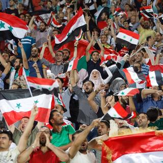 Les supporters de la Syrie lors de son match face à l'Iran, le 05 septembre 2017. [EPA/Keystone - Abedin Taherkenareh]