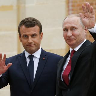 Emmanuel Macron et Vladimir Poutine. [Reuters - Alexander Zemlianichenko]