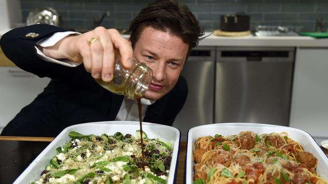 epa05615463 (FILE) A file photograph showing British Celebrity chef Jamie Oliver helping out at Jamie's Ministry of Food in Sydney Australia, 30 March 2015. Media reports on 03 November 2016 state that receivers for the Keystone Group have announced the Jamie Oliver Group as the preferred Bidder for the Keystone Group’s Australian Jamie’s Italian restaurant franchise chain. Receiver Morgan Kelly said it was an ideal outcome for the Australian Jamie’s Italian franchises to return to parent group ownership and operation. Jamie Oliver said, the Australian franchise, some of the best performing Jamie’s Italian restaurants worldwide, were put up for sale when the franchise partner, Keystone Group went into receivership over the summer. This was in no way a reflection on the performance or success of the restaurants. EPA/PAUL MILLER AUSTRALIA AND NEW ZEALAND OUT [EPA - PAUL MILLER]