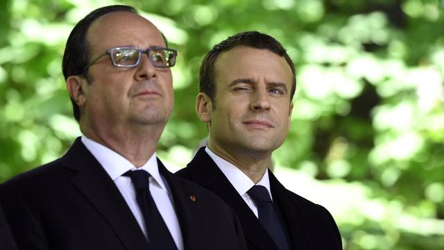François Hollande et Emmanuel Macron: d'une présidence à l'autre. [Pool/AFP - Eric Fefferberg]