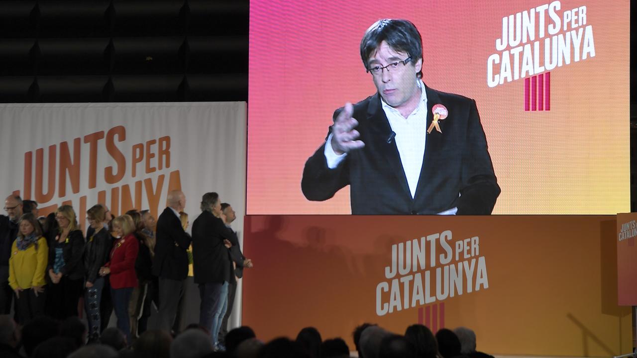 Carles Puigdemont s'est adressé aux militants du groupe "Junts per Catalonia" ("Ensemble pour la Catalogne") via vidéoconférence. [AFP - LLUIS GENE]