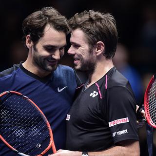 Roger Federer et Stanislas Wawrinka en novembre 2015. [AFP - Leon Neal]