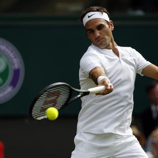 Roger Federer à Wimbledon ce mardi. [AP/Keystone - Alastair Grant]