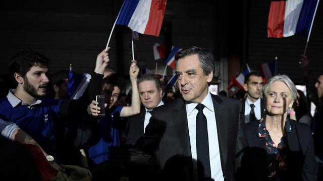 François Fillon s'est rendu à son grand meeting en compagnie de sa femme Penelope. [afp - Eric Feferberg]