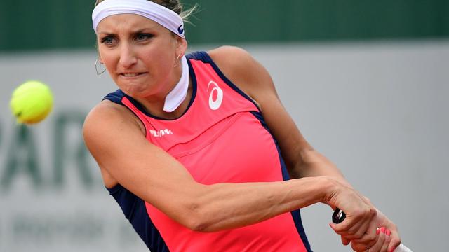 epa06001829 Timea Bacsinszky of Switzerland in action against Madison Brengle of the USA during their women’s single 2nd round match during the French Open tennis tournament at Roland Garros in Paris, France, 31 May 2017. [EPA - YOAN VALAT]