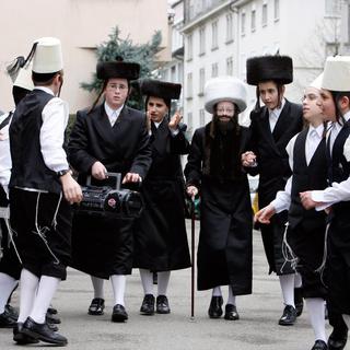 Des enfants célèbrent la fête juive Pourim à Zurich.
Alessandro Della Bella
Keystone [Keystone - Alessandro Della Bella]