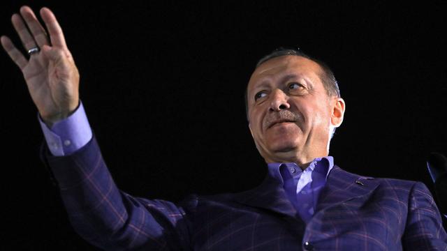 Le président Erdogan doit se contenter d'une victoire a minima. [EPA/Keystone - Tolga Bozoglu]