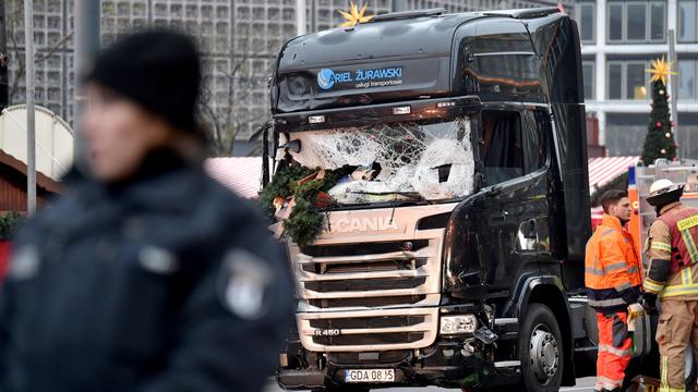 L'attentat au camion-bélier a fait 12 morts le 19 décembre sur le marché de Noël de Berlin. [keystone - Britta Pedersen]