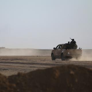 Des combattants des forces démocratiques syriennes qui ont fait face à l'EI près d'Hassaké en Syrie. [Reuters - Rodi Said]