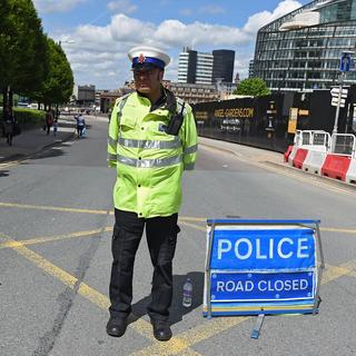 Les environs de la Manchester Arena ont été bloqués par la police. [keystone - EPA/Andy Rain]