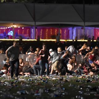 Des personnes sous le choc après la fusillade de Las Vegas. [Getty Images/afp - David Becker]
