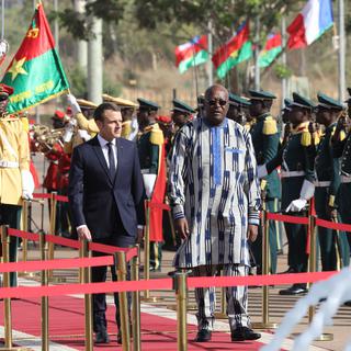 Emmanuel Macron a entamé sa tournée africaine au Burkina Faso. [AFP - Ludovic Marin]
