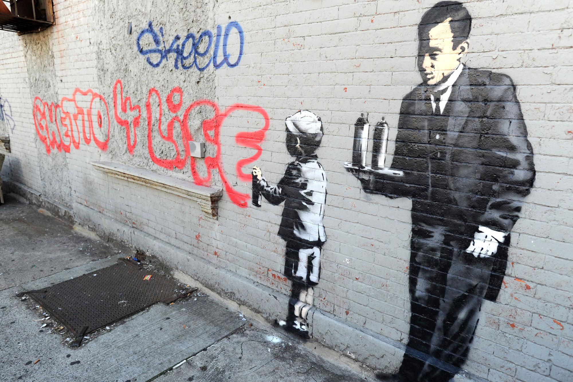 Un oeuvre de l'artiste Banksy dans le Bronx photographiée le 21 octobre 2013. [AFP - Dennis Van Tine]