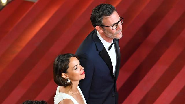 Le comédien Louis Garrel, Berenice Bejo et le réalisateur Michel Hazanavicius lors de la projection du film "Le Redoutable" à Cannes. [AFP - Loic Venance]