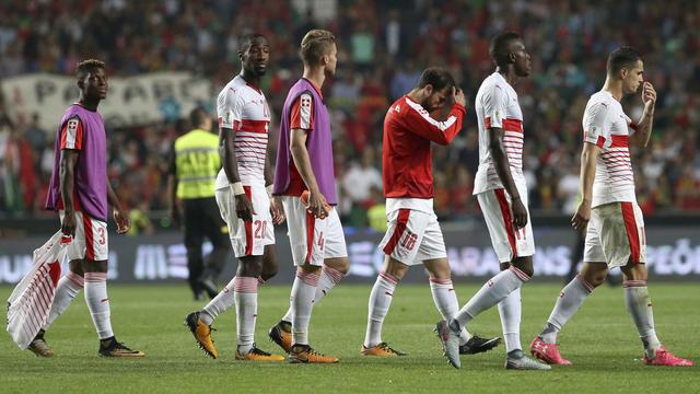 La grosse déception des joueurs de l'équipe de Suisse. [Armando Franca]