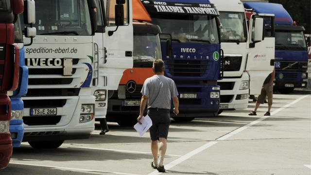 Un chauffeur de camion à la frontière de Thayngen, dans le canton de Schaffhouse. [Keystone - Steffen Schmidt]