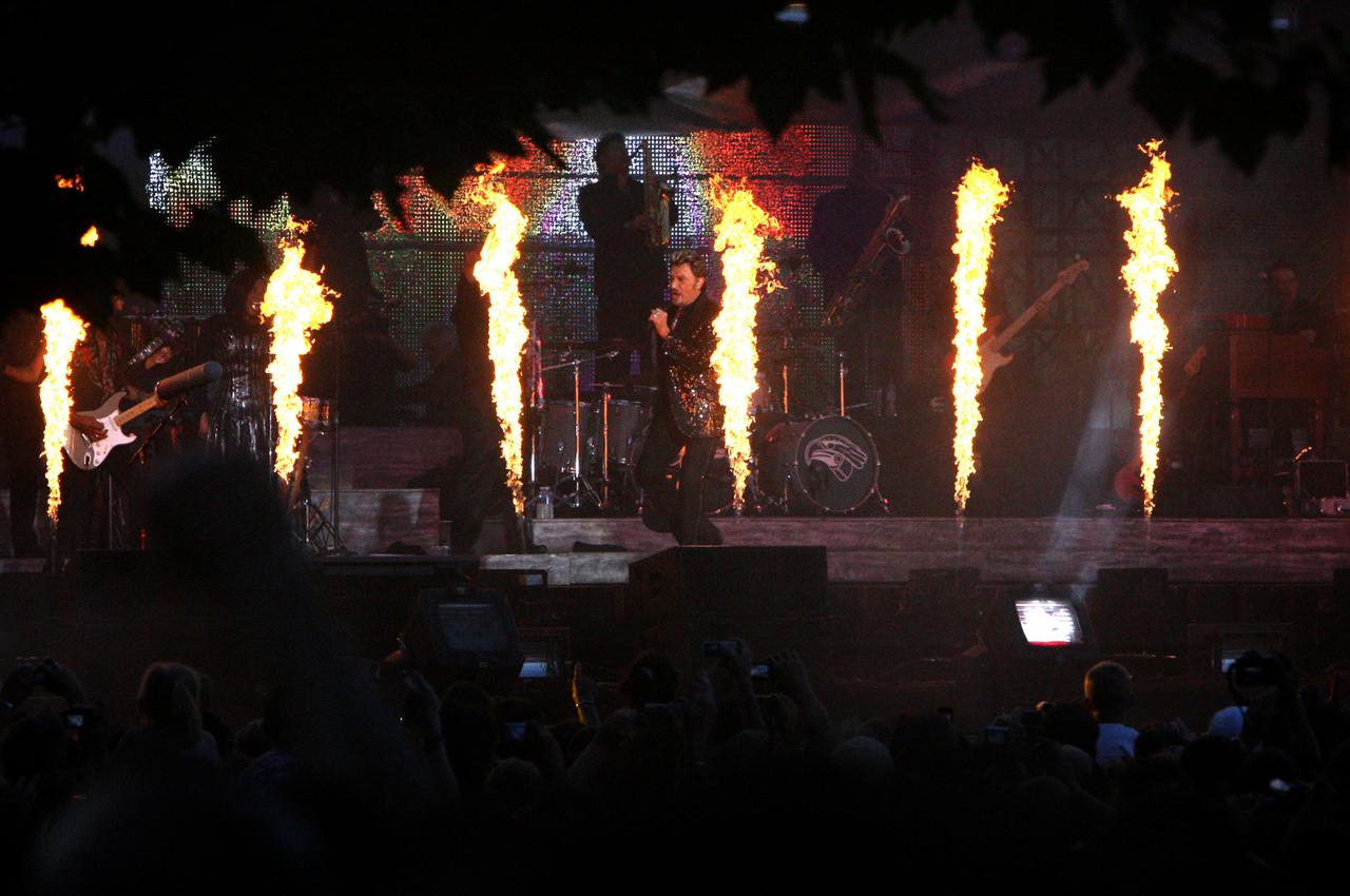 Johnny Hallyday, le 14 juillet 2009. [AFP - Mehdi Fedouach]