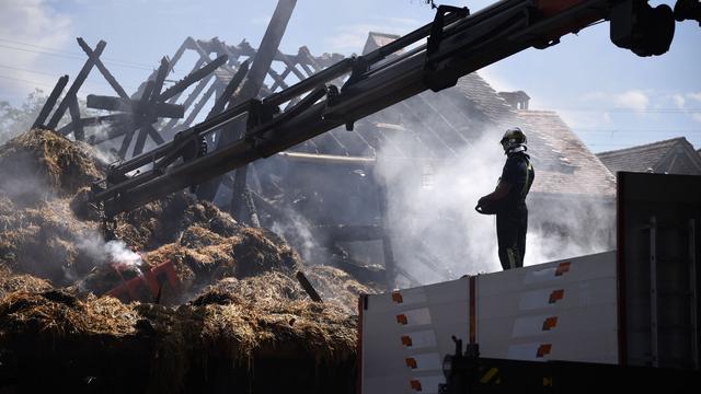 Incendie à Payerne, dans la Broye, le 29 juillet 2017. [Keystone - Christian Brun]