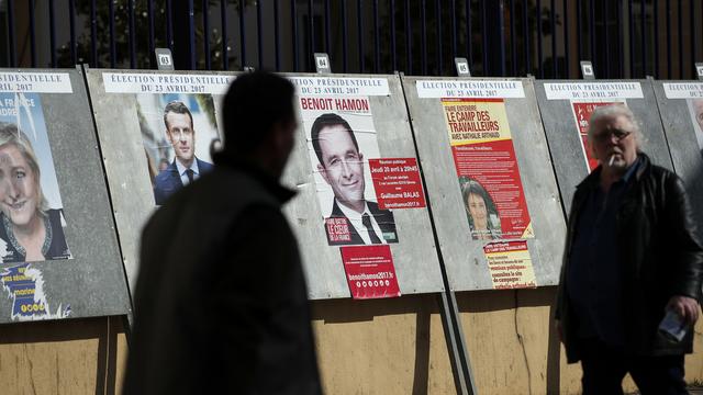 La campagne pour l'élection présidentielle française s'achève à minuit. [Keystone - AP Photo/Christophe Ena]